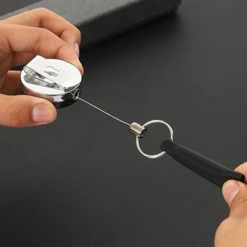 Savaime atsitraukiančios vielinės virvės ritės sandarus metalinis diržo spaustukas su rašikliu / pieštuko laikikliu