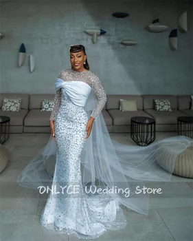 Sparkly Naujo dizaino afrikietiškos vestuvinės suknelės ilgomis rankovėmis Afrikietiškos vestuvinės suknelės su šydo kristalais karoliukais ilgomis rankovėmis Undinėlė Vestuvinė suknelė Sužadėtuvės